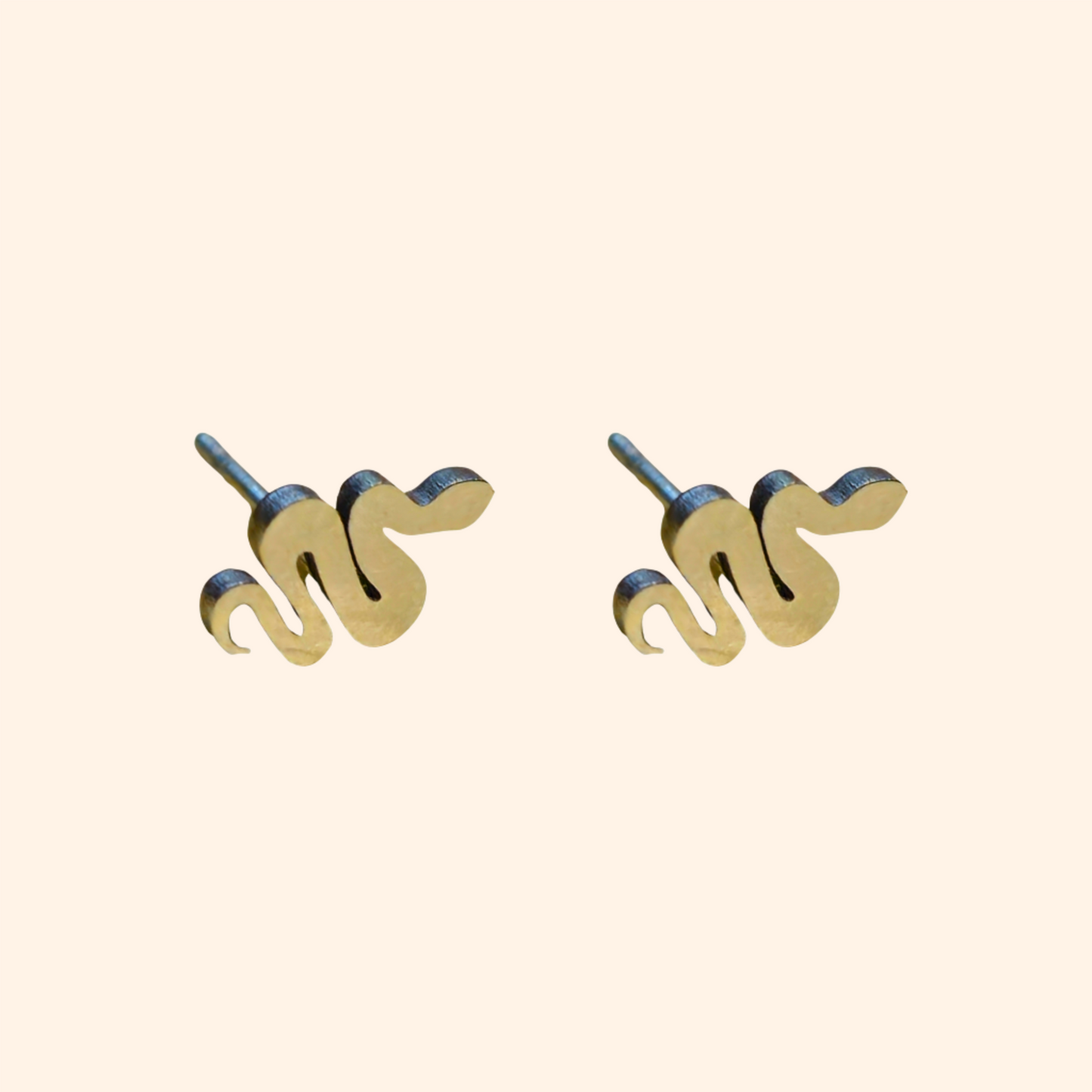 The Snake Small Earrings by Roots Jewellery, with their elegant gold snake-shaped design, rest on a light background, showcasing a stylish accessory perfect for any occasion.