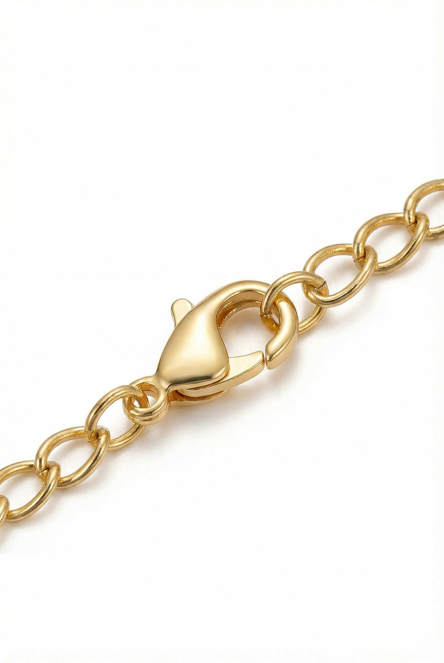 Gold chain bracelet with clasp on a white background