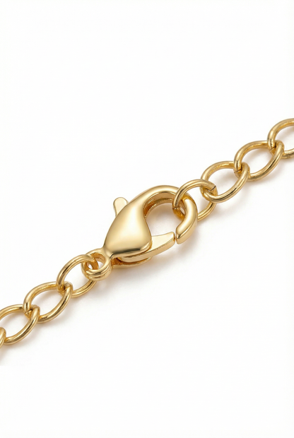 Gold chain bracelet with clasp on a white background